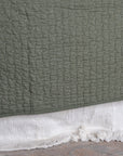 Olive Green Quilt With Cross Stitches