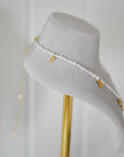 Intent Pearl and Gold Plated Charm Necklace