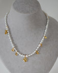 Intent Pearl and Gold Plated Charm Necklace