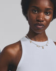 Intent Pearl and Gold Plated Charm Necklace