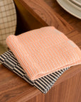 Oyoy living dish cloths stringa in anthracite and coral 100% organic cotton fabric