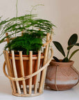 bloomingville terracotta pot in bamboo holder