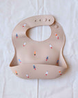 Mushie Silicone Bib rockets