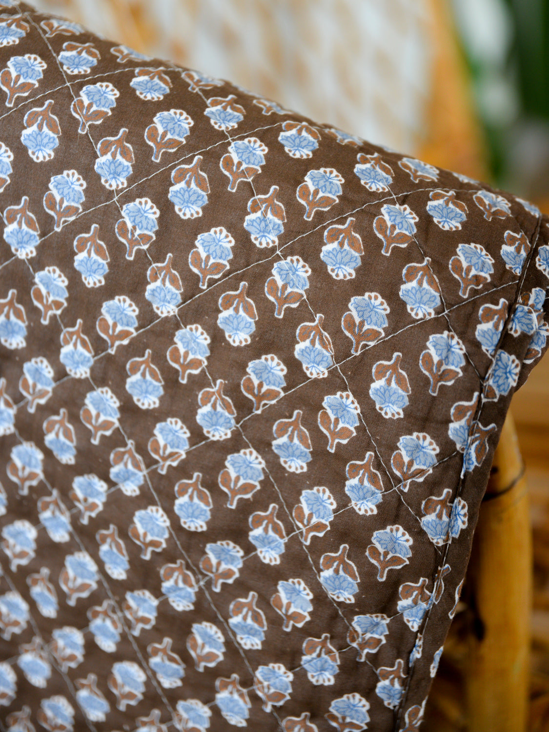 Brown and Blue Floral Quilt