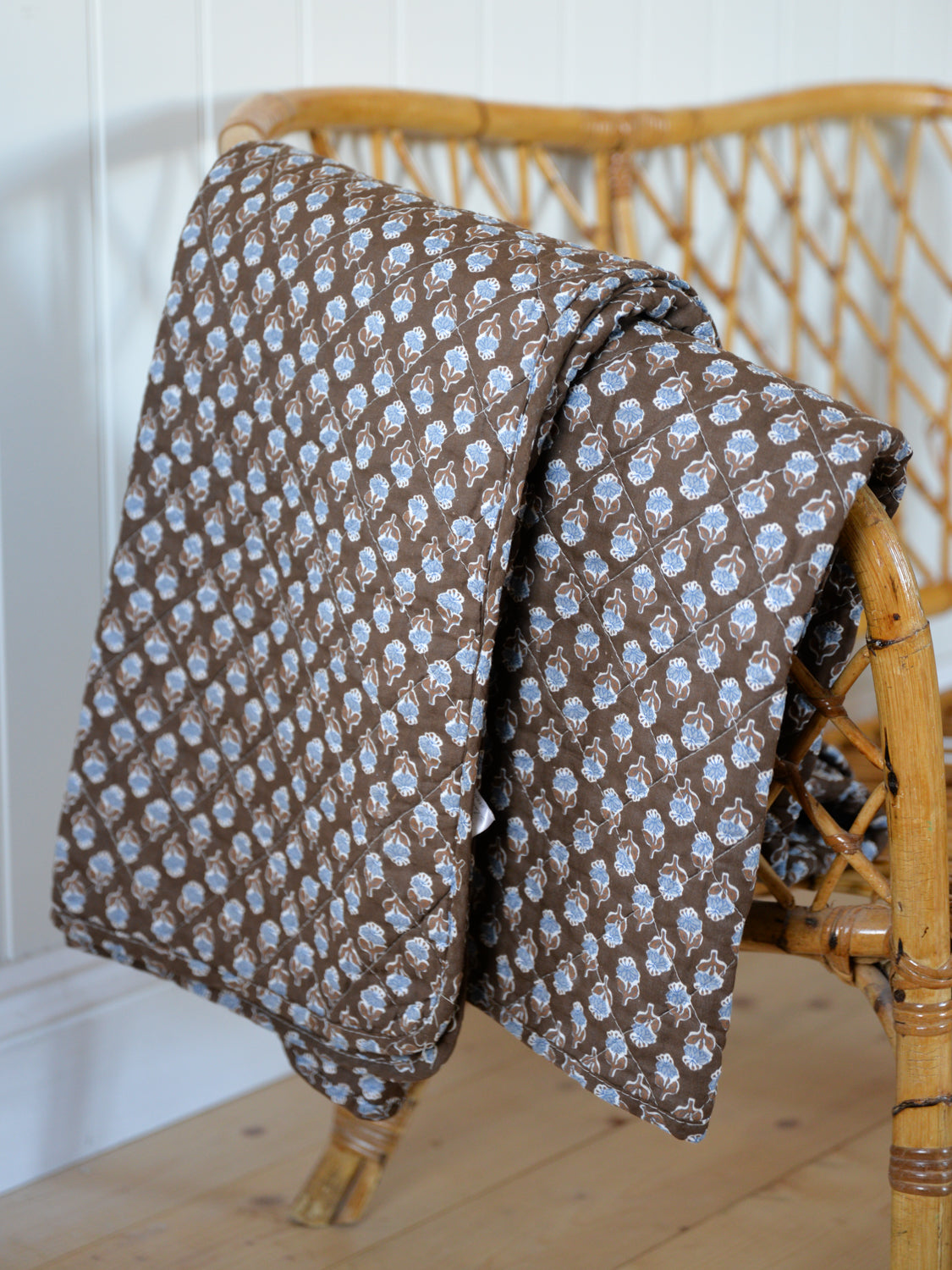 Brown and Blue Floral Quilt