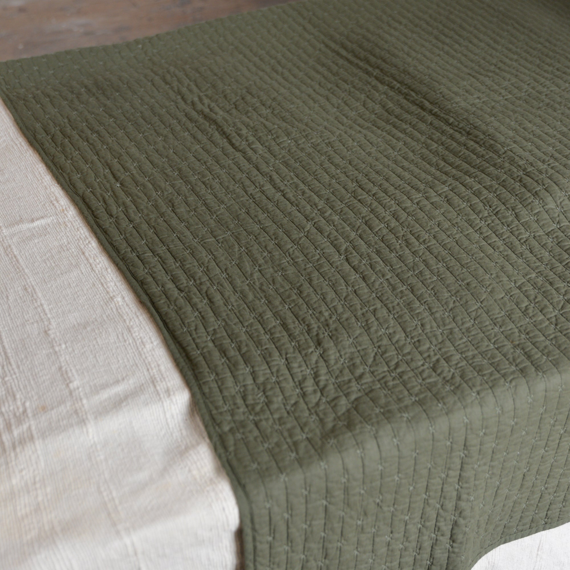 Olive Green Quilt With Cross Stitches