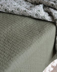 Olive Green Quilt With Cross Stitches