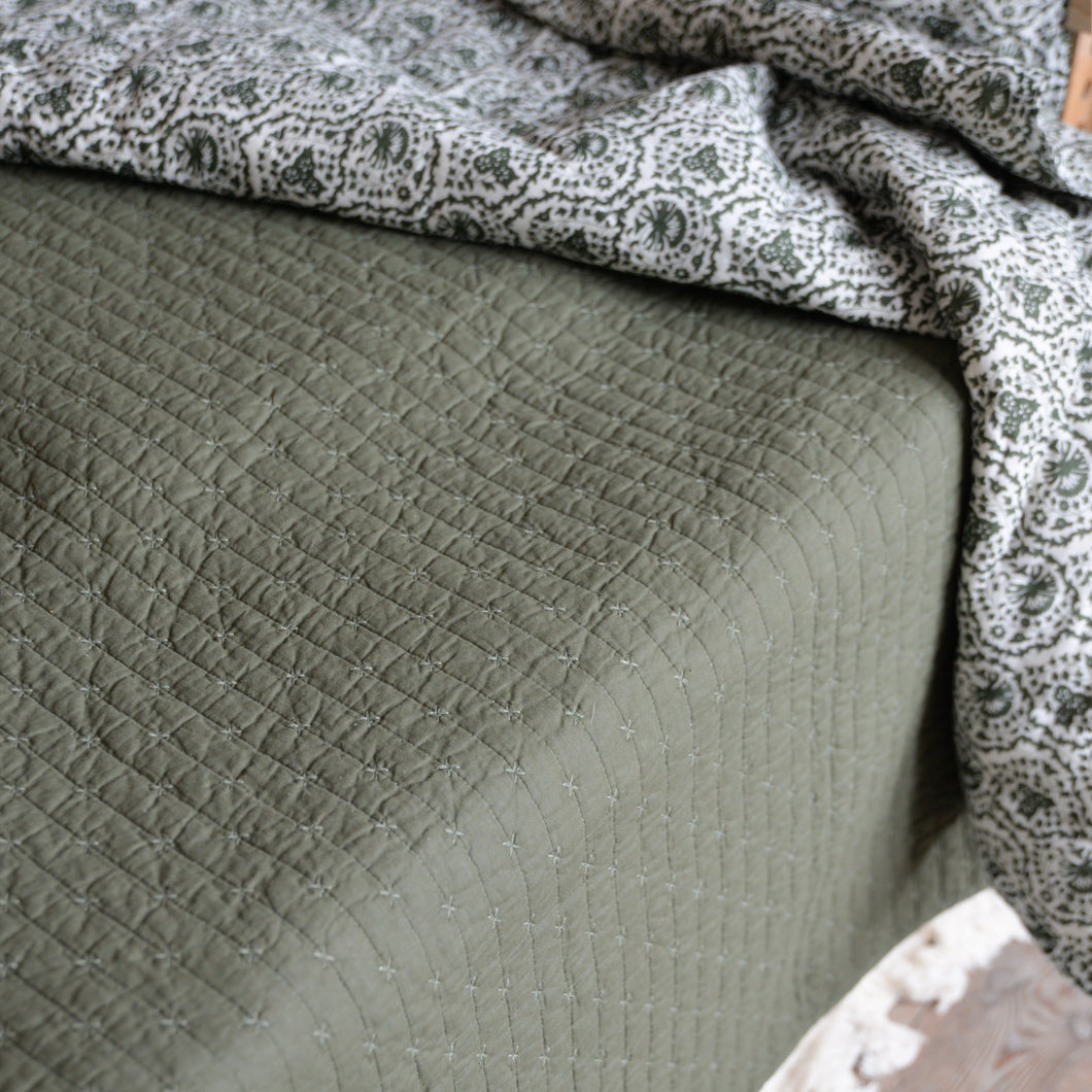 Olive Green Quilt With Cross Stitches