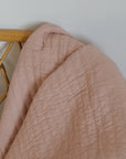 Pale Pink Quilt With Cross Stitches