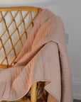 Pale Pink Quilt With Cross Stitches