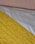 Quilt Yellow with White Flowers 130 x 180