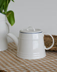White Porcelain Teapot with Blue Rim