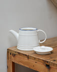 White Porcelain Teapot with Blue Rim