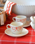 White Cup With Saucer / Red Bow
