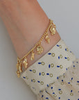 Sea Shell Charm bracelet in Gold