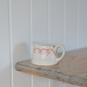 Milk Jug with Red Bow