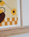 Sunflowers in Burgundy Vase by Frankie Penwill