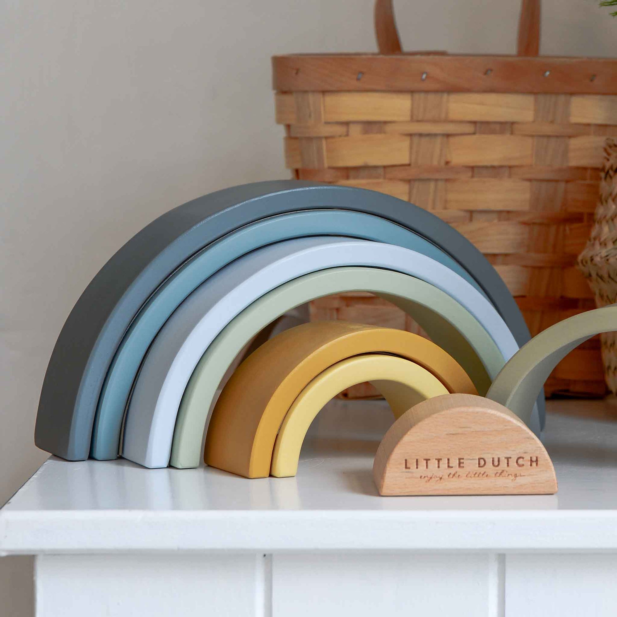 Wooden rainbow stacking tower in blue