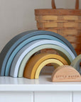 Wooden rainbow stacking tower in blue