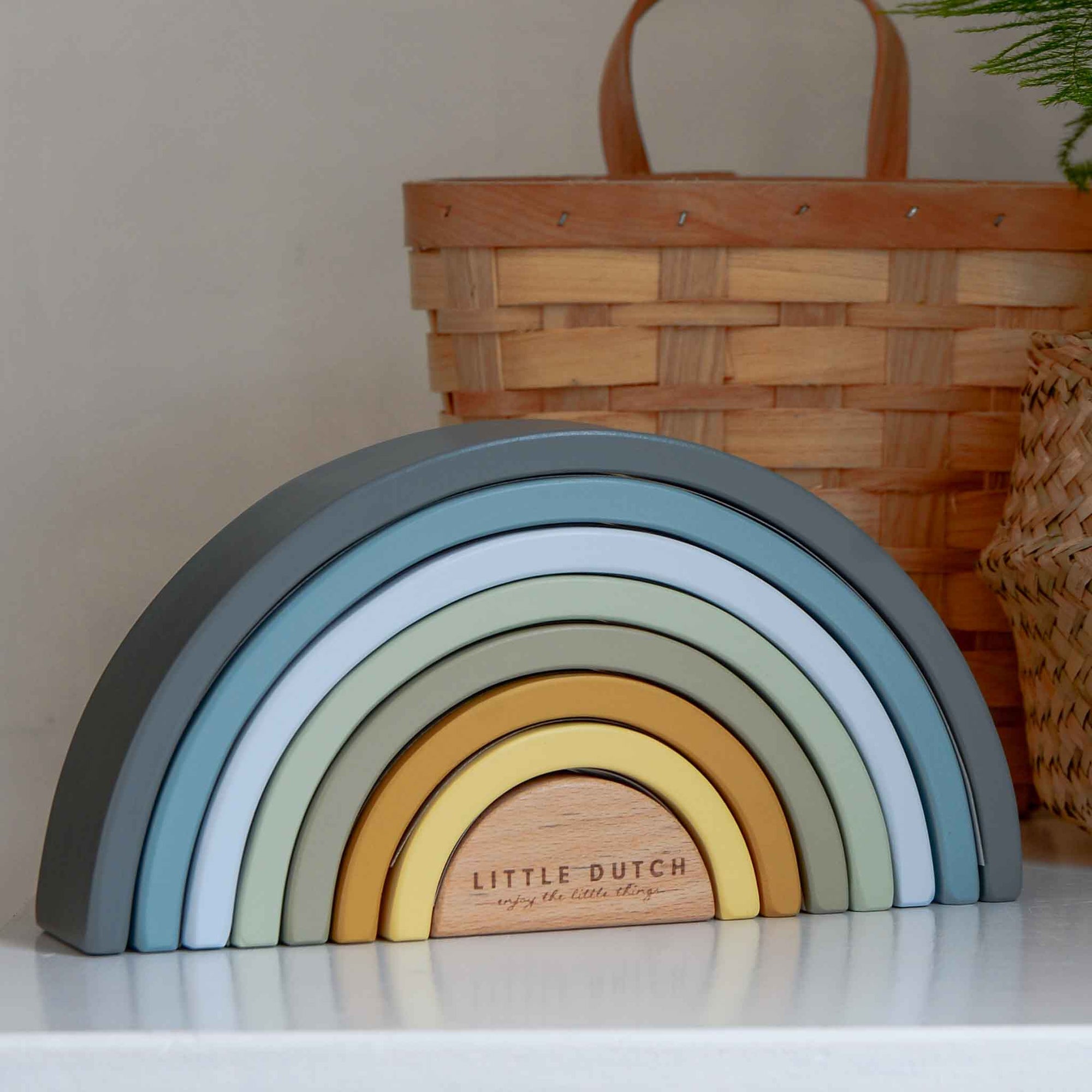 Wooden rainbow stacking tower in blue