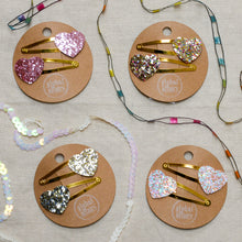 Load image into Gallery viewer, global affairs glitter heart clips