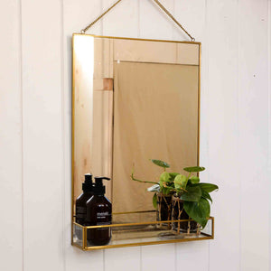 brass framed gold mirror with shelf