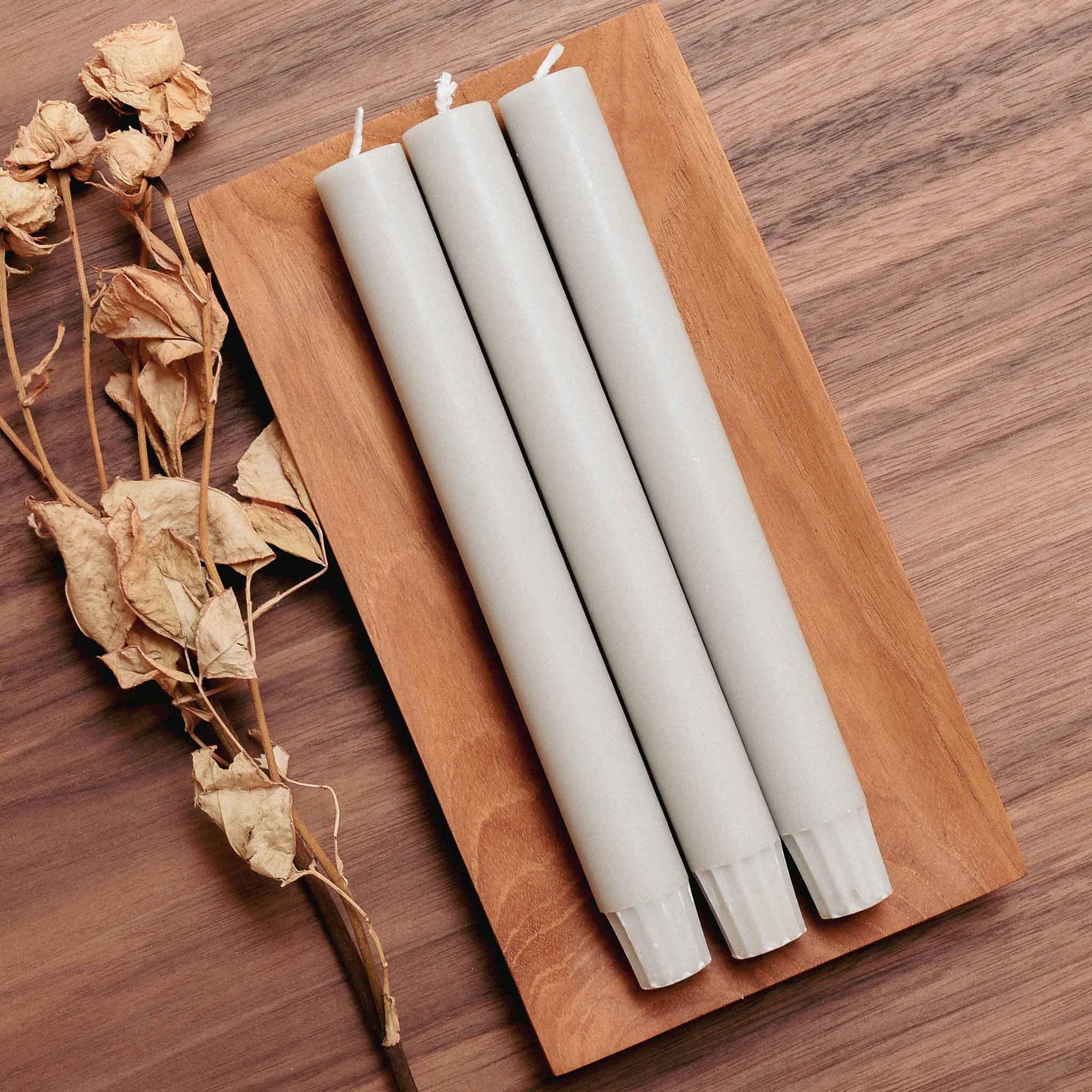 naturally made light drey tampered end single dinner candle from original home