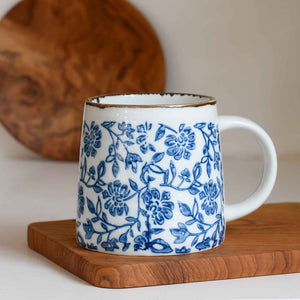 Molly-large-straight-edged-handle-mug-by-bloomingville-in-blue-mimosa-print-design