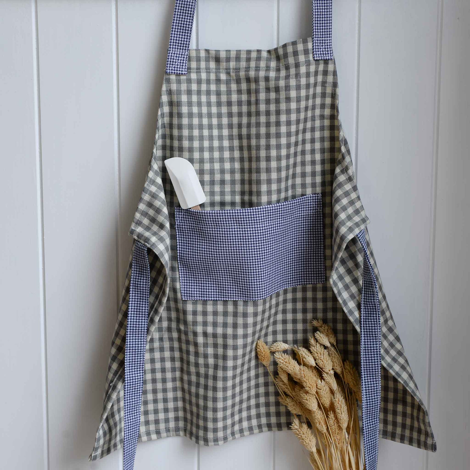Redecker Children's Apron blue grey gingham with waist ties and a front pocket