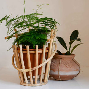 bloomingville terracotta pot in bamboo holder