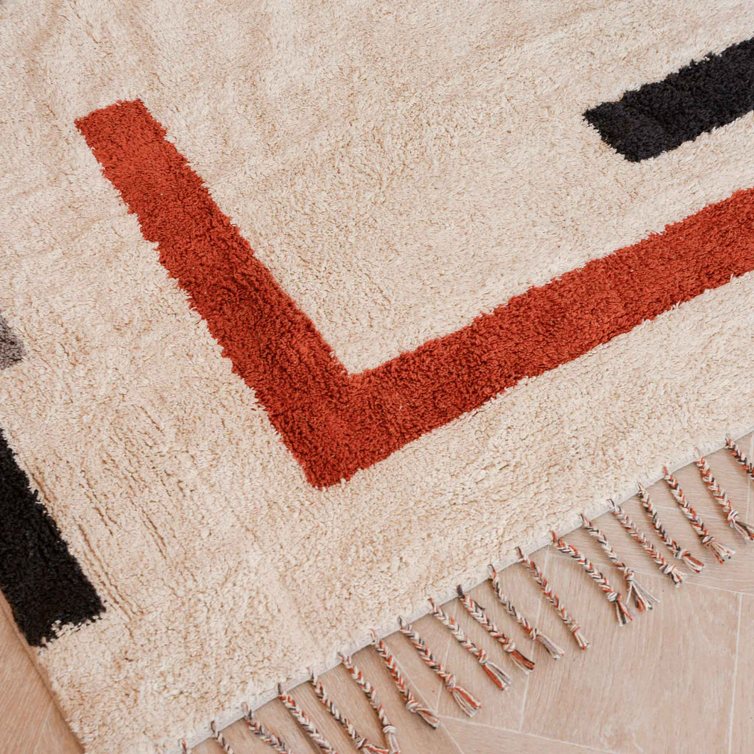 Jue abstract soft off white and colour block rug by bloomingville