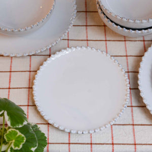 pearl white china bread plate with ribbed detail edging