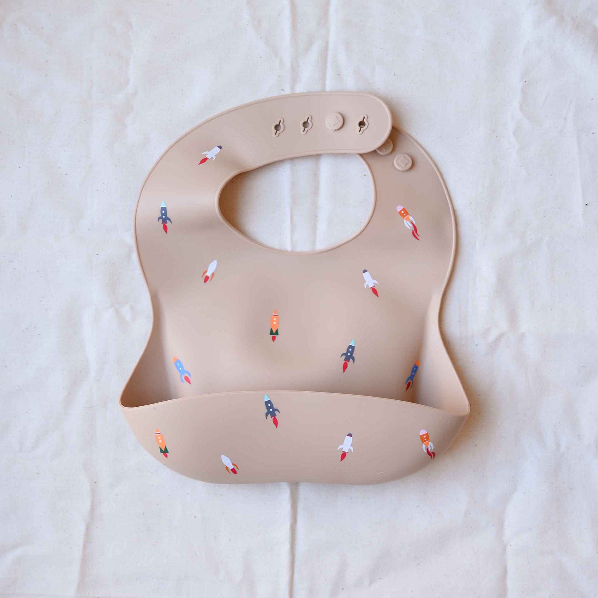 Mushie Silicone Bib rockets